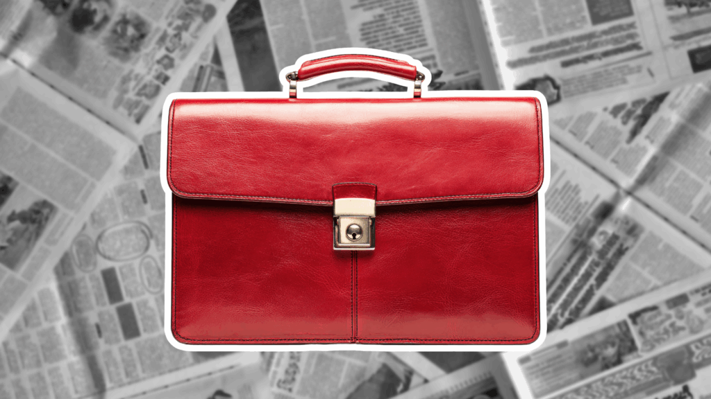 Red briefcase and newspaper.