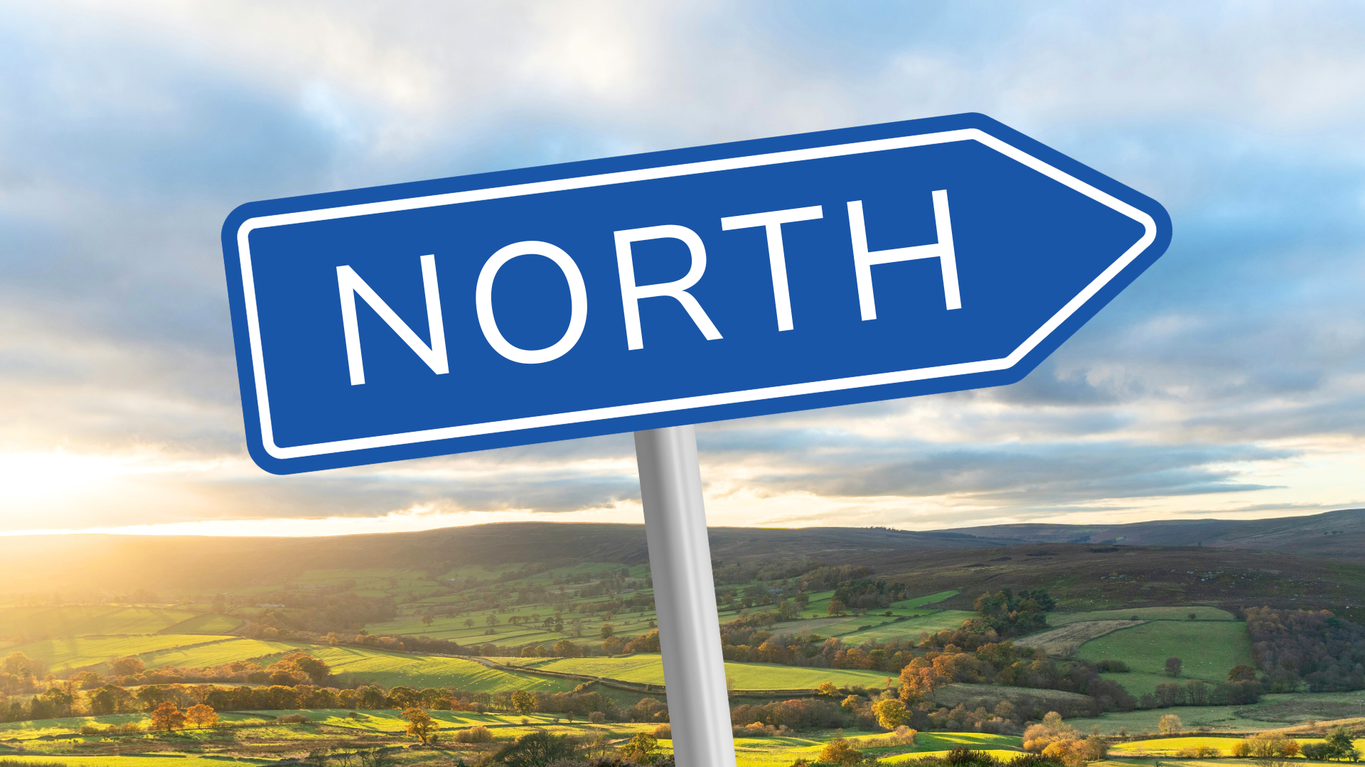 A blue sign pointing North.