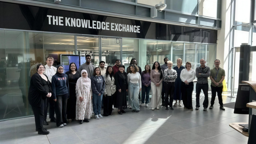 Project team members stood in front of The Knowledge Exchange.